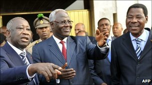 Laurent Gbagbo (left)