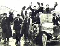 Image of released Republican prisoners beside car