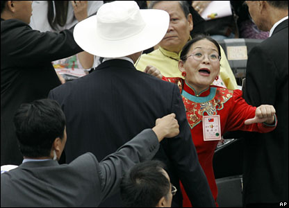A woman shouts slogans against Taiwanese president Chen Shui-bian during national day celebrations in Taipei.