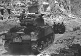 Tanks and jeeps entering Monte Cassino, May 1944