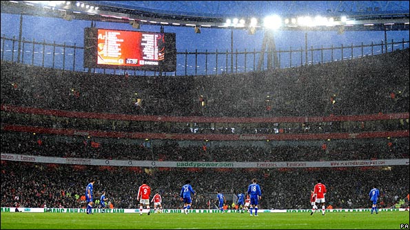 Snow falls during Arsenal's game with Everton at the Emirates