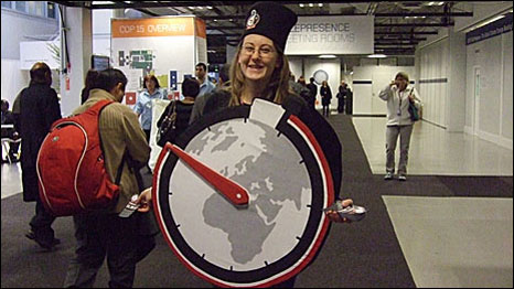 Protester wearing climate change clock