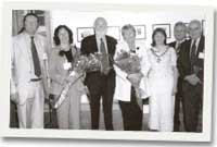 Dave Petersen (Cadeirydd y Ganolfan), Shelagh Hourahane (Trefnydd yr Arddangosfa), Nick Ainger A.S, Jenny Randerson A.C, Maer San Clêr, Y Cyng. Jane Rees, Mr Tom Rees a'r Cyng. David Thomas, Trelech yn agoriad swyddogol Canolfan Grefft Gorllewin Cymru