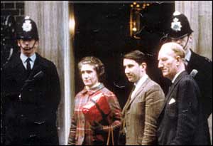 Madge Elliot from Hawick in the Borders area of Scotland, pictured standing with David Steel on the steps of Number 10 Downing Street in 1968. She is holding a petition calling for the closure of the Edinburgh - Carlisle route, 'The Waverley Line', to be stopped. It was earmarked for closure under the Beeching proposals and was eventually closed in 1969. She has been campaigning for its restoration ever since.