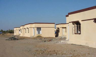 A row of newly built quake resistant houses in Lakhapar Pakistan