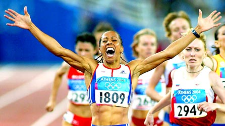Kelly Holmes crosses the finishing line