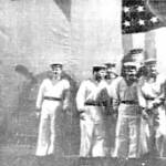 Russian Naval Concert Party on Board HMS NIGERIA at Murmansk 1941. Picture taken in the hangar. The Cruiser carried two Seaplanes which were launched by Catapult crewed by the Fleet Air Arm.
