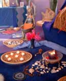 Statues, candles and arrangements of stones and shells adorn the altar