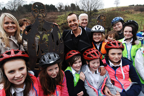 Julien Macdonald next to his steel sculpture in Merthyr. Photo: Sustrans