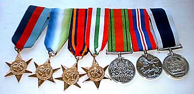Awarded to Bill from left to right: 1939-45 Star; N. Atlantic Star; Burma Star; Italian Star; Defence Medal; Victory Medal; Blue Peter Medal.