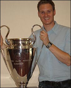 Dan Walker with the Champions League trophy