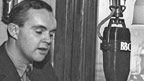 A BBC presenter in the studio, 1943