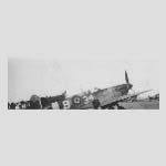A Photograph of Ron Smith next to a Spitfire believed to have been taken whilst training in Canada