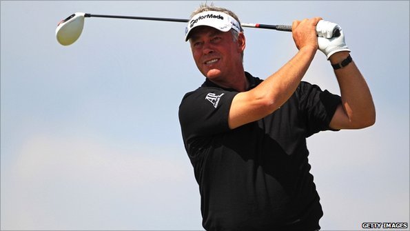 Darren Clarke enjoyed a second successive 68 to move to the top of the leaderboard