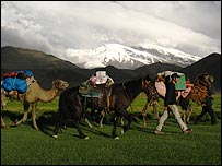 The caravan passes Muztagh Ata