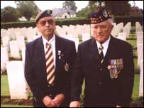 Ernest & friend reflect at War Cemetery