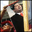 partidária com cartaz de Hugo Chávez