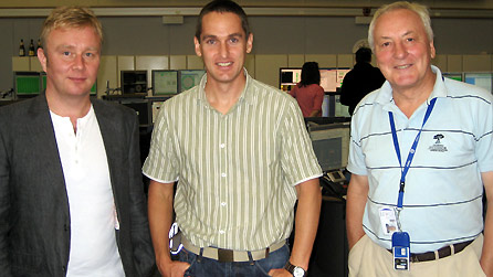 Adam Walton, Dr. Rhodri Jones and Dr. Lyn Evans in the Main Control Centre for the Large Hadron Collider at CERN in Geneva