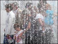 You have to jump quickly to get inside the fountain before you get wet, and then stand very still and hope the wind doesn’t blow.