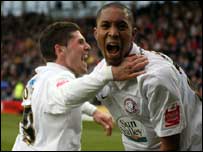 Sherjil MacDonald and Gary Hooper celebrate