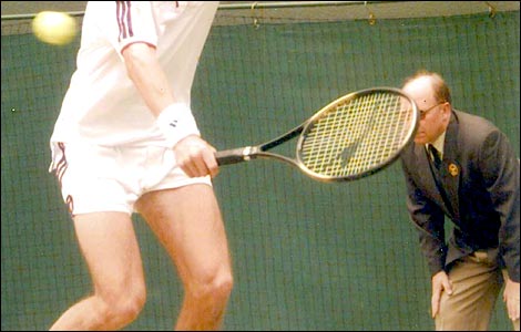 Brian Partridge, from Cheltenham, watches Tim Henman play at Wimbledon in 1997