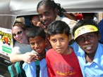 Ruth Jessop and children posing in rickshaw