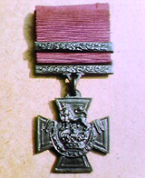 The Victoria Cross, which bears the inscription 'For Valour'