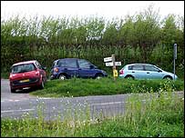 Cars parked on Earls Colne island