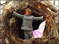 The birdman flinging feathers