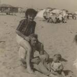 This is a picture of me with my uncle on the beach in Venice.