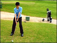 Hershill playing golf