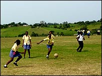 Pupils enjoying a game of football