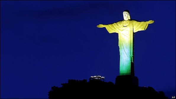 Christ the Redeemer statue, Rio de Janeiro, lit in Brazil's national colous