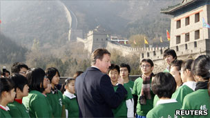David Cameron talking to students by the Great Wall of China