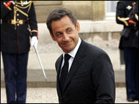 Nicholas Sarkozy arrives at work