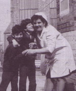 A Meltis worker and her children