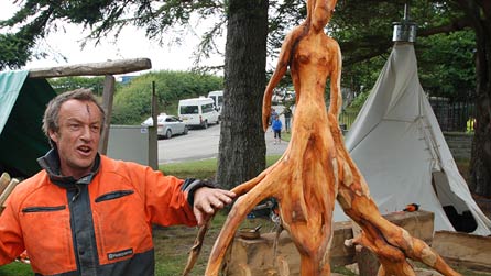 Simon with one of his wooden creations