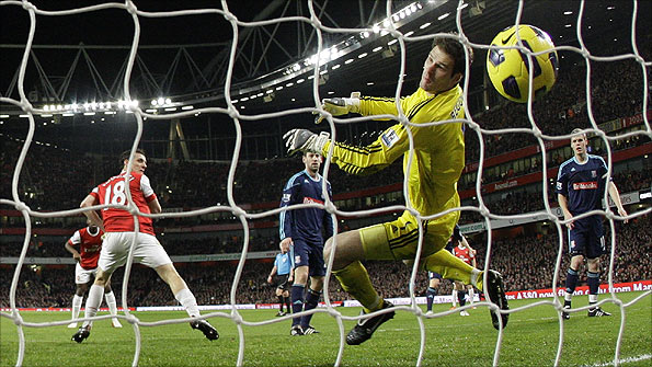 Sebastien Squillaci scores from a corner as Arsenal beat Stoke 1-0 at the Emirates Photo: AP
