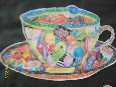 Surreal dolly mix cup and saucer