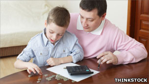 Man and boy count money