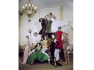 Svetlana is seated in green dress.