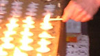 Hand lighting candles