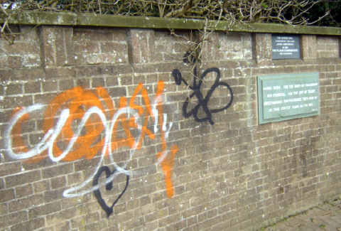 vandalised wall