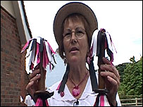 Woman with decorated sticks
