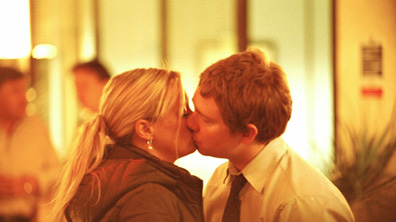 Tim and Dawn kissing