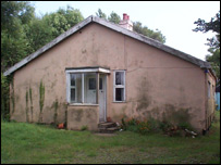 Bungalow facade for railway carriage houses