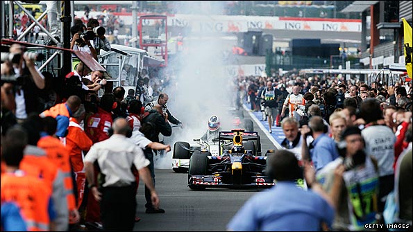 Rubens Barrichello's Brawn catches fire in the pits after the Belgian Grand Prix