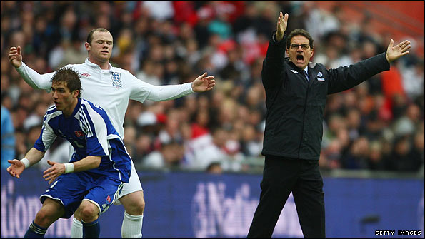 Wayne Rooney (left) and Fabio Capello during the friendly against Slovakia