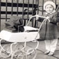 A proper little madam - Valerie aged 20 months at Christmas with her new dolly and pram
