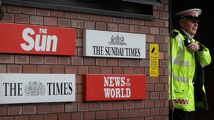 papers and policeman